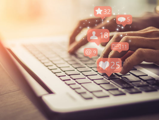 Laptop Search with social media icons